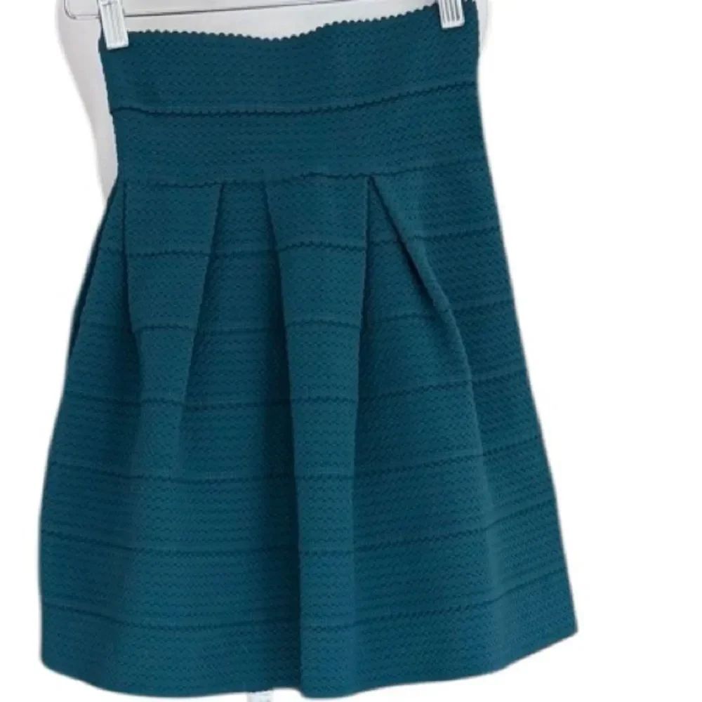 H&M Teal textured, pleated skater skirt size XS.